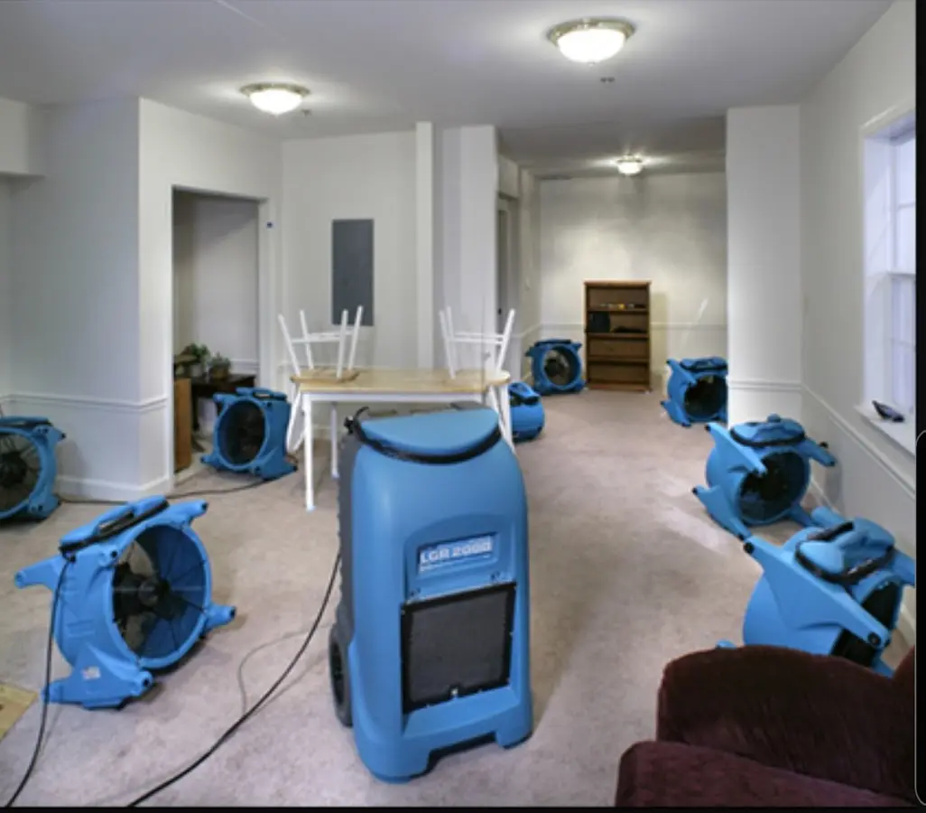 Air movers and dehumidifier setup for Water Damage Restoration in West Clarkston-Highland